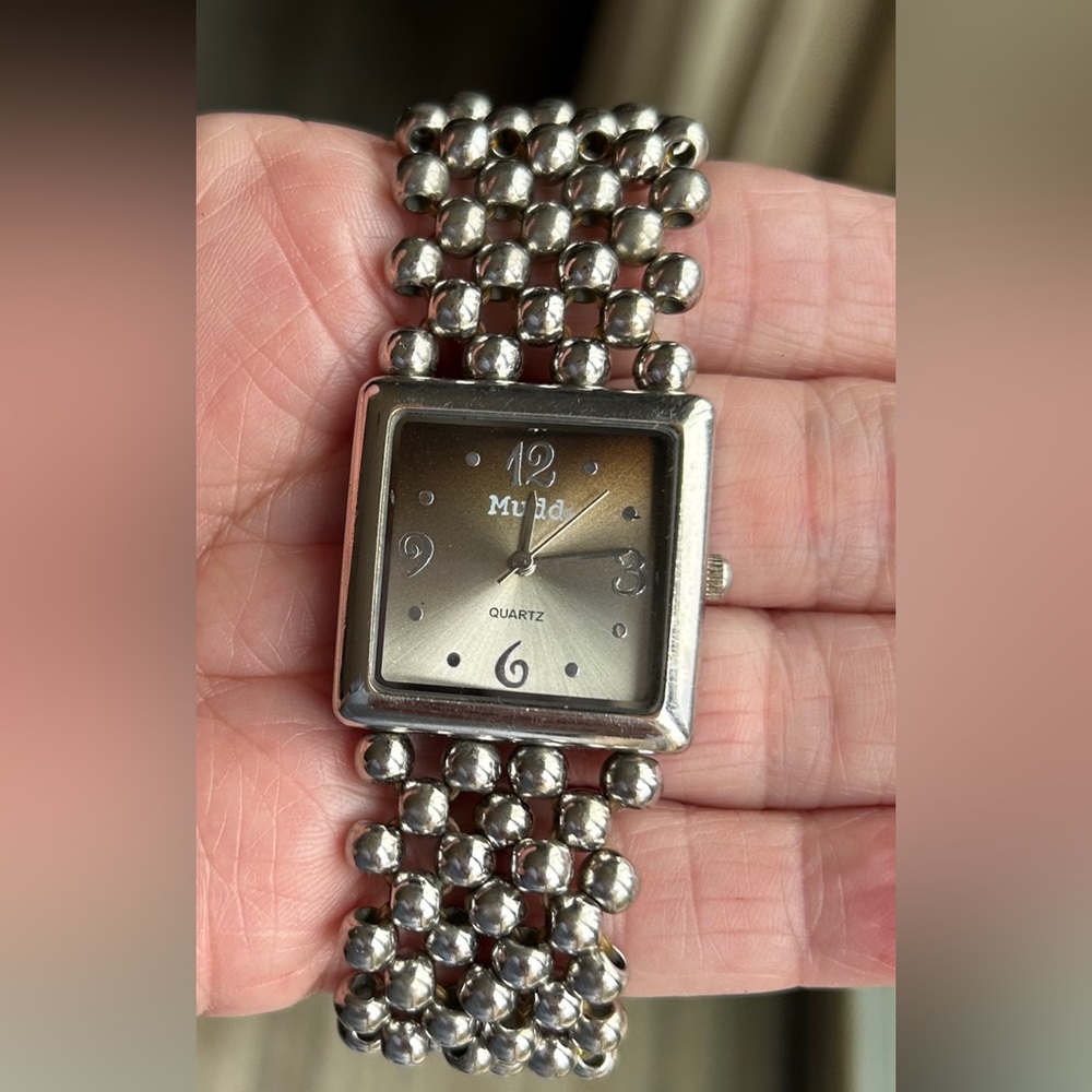Ladies Mudd watch. Beautiful like new brown square face. No scratches. Runs well